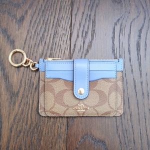 Coach blue and monogram card case